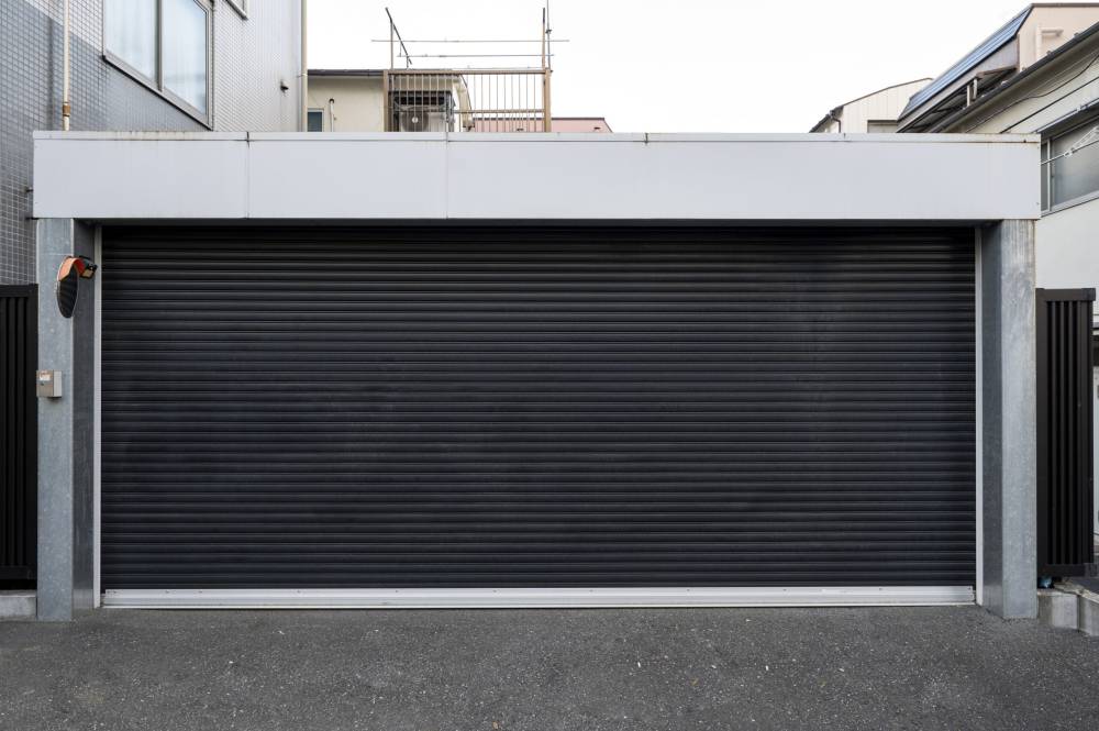 motorisation porte de garage près de Manthelan